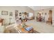 Bright dining room with a table and chairs, adjacent to the living room at 6466 Scotch Pine Cir, Las Vegas, NV 89146