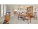 Cozy dining room with kitchen access and a view of the living room at 6466 Scotch Pine Cir, Las Vegas, NV 89146