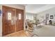 Inviting entryway with double doors and hardwood flooring at 6466 Scotch Pine Cir, Las Vegas, NV 89146