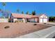 Ranch-style home with landscaped yard and two-car garage at 6466 Scotch Pine Cir, Las Vegas, NV 89146