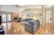 Living room features hardwood floors, brick fireplace and French doors at 6466 Scotch Pine Cir, Las Vegas, NV 89146