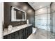 Spa-like bathroom with marble finishes and walk-in shower at 686 Tranquil Rim Ct, Henderson, NV 89012