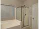 Bathroom with bathtub, shower, and updated fixtures at 7109 Bocaire Dr, Las Vegas, NV 89131