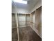 Large walk-in closet with ample hanging space and shelving at 7109 Bocaire Dr, Las Vegas, NV 89131