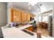 Kitchen with breakfast nook and wood cabinets at 7258 Rock Castle Ave, Las Vegas, NV 89130