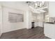 Kitchen with stainless steel appliances and white cabinets at 7748 Selby Ct, Las Vegas, NV 89147