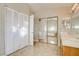 Bathroom with double sinks,tiled floor and shower at 8113 Bay Springs Dr, Las Vegas, NV 89128