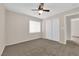 Spacious bedroom with large closet and ceiling fan at 8356 San Mateo St, North Las Vegas, NV 89085