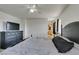 Main bedroom with king-size bed and large dresser at 9100 Spoonbill Ridge Pl, Las Vegas, NV 89143