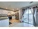 Bright kitchen with stainless steel appliances and white cabinets at 9100 Spoonbill Ridge Pl, Las Vegas, NV 89143