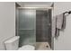 Clean bathroom featuring a shower stall and toilet at 104 Masserta Ct, Las Vegas, NV 89183