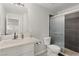 Updated bathroom with a walk-in shower and modern vanity at 104 Masserta Ct, Las Vegas, NV 89183