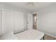 Bright bedroom with double-door closet and access to laundry at 104 Masserta Ct, Las Vegas, NV 89183