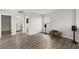 Bonus room with wood-look floors and access to bathroom at 104 Masserta Ct, Las Vegas, NV 89183