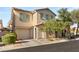 Beautiful two story home with attached garage and landscaping at 104 Masserta Ct, Las Vegas, NV 89183