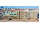 Aerial view of building, tennis court, and pool at 3930 University Center Dr # 307, Las Vegas, NV 89119