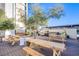 Community BBQ area with picnic tables at 3930 University Center Dr # 307, Las Vegas, NV 89119
