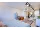 Bright bedroom with a queen bed and access to the bathroom at 3930 University Center Dr # 307, Las Vegas, NV 89119