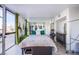 Well-lit bedroom with a full-size bed and city view at 3930 University Center Dr # 307, Las Vegas, NV 89119