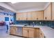 Updated kitchen featuring stainless steel appliances and quartz countertops at 3930 University Center Dr # 307, Las Vegas, NV 89119