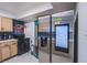 Modern kitchen with stainless steel appliances and blue tile backsplash at 3930 University Center Dr # 307, Las Vegas, NV 89119