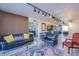 Open living room showcasing a glass-top coffee table and comfortable seating at 3930 University Center Dr # 307, Las Vegas, NV 89119