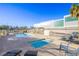 Community pool and spa with lounge chairs at 3930 University Center Dr # 307, Las Vegas, NV 89119