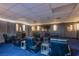 Community theater room with reclining chairs at 3930 University Center Dr # 307, Las Vegas, NV 89119