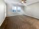 Spacious bedroom with carpeting and door to exterior at 480 Sterling Falls Ave, Henderson, NV 89011