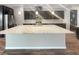 Spacious kitchen with large island, granite countertops, and dark wood cabinets at 480 Sterling Falls Ave, Henderson, NV 89011