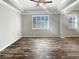 Bright living room with hardwood floors, high ceilings, and ceiling fan at 480 Sterling Falls Ave, Henderson, NV 89011