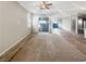 Spacious living room featuring hardwood floors and access to backyard patio at 480 Sterling Falls Ave, Henderson, NV 89011