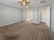 Spacious main bedroom with neutral walls and carpeted floors at 480 Sterling Falls Ave, Henderson, NV 89011