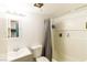 Bathroom with shower/tub combo, gray curtain, and vanity at 523 Fir St, Boulder City, NV 89005