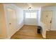 Small dining area with light blue walls and wood flooring at 523 Fir St, Boulder City, NV 89005