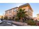 Tan two-story building with palm trees and landscaping at 523 Fir St, Boulder City, NV 89005