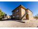 Tan two-story building with exterior staircase at 523 Fir St, Boulder City, NV 89005