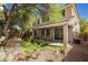 Cozy backyard featuring desert landscaping and a covered patio at 561 Tecate Valley St, Las Vegas, NV 89138