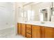 Bright bathroom boasts double sinks, bathtub, and marble floors at 561 Tecate Valley St, Las Vegas, NV 89138