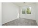 Bright bedroom with new carpet and view from two windows at 561 Tecate Valley St, Las Vegas, NV 89138