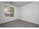 Bright bedroom featuring plush carpeting and window with views of the exterior at 561 Tecate Valley St, Las Vegas, NV 89138