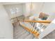 Bright entryway featuring staircase, tile flooring, and modern light fixtures at 561 Tecate Valley St, Las Vegas, NV 89138