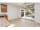 Bright breakfast nook with granite countertops and sliding glass door access to the backyard at 561 Tecate Valley St, Las Vegas, NV 89138