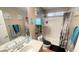 Bathroom with shower/tub combo, and teal accents at 59 Dreamy Hill Ave, North Las Vegas, NV 89031
