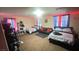 Spacious bedroom with two beds and a couch at 59 Dreamy Hill Ave, North Las Vegas, NV 89031