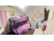 bedroom with bunk beds and colorful decor at 59 Dreamy Hill Ave, North Las Vegas, NV 89031
