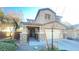 Two-story house with stone accents, attached garage, and landscaping at 59 Dreamy Hill Ave, North Las Vegas, NV 89031