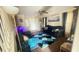 Living room with two blue velvet sofas and a patterned rug at 59 Dreamy Hill Ave, North Las Vegas, NV 89031