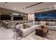 Modern bar area with seating, city views, and sleek design at 705 Dragon Peak Dr, Henderson, NV 89012