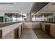 Modern wet bar with sleek cabinetry and a wine cooler at 705 Dragon Peak Dr, Henderson, NV 89012